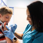 Brayden McMichael, 10, gets his annual flu shot. While medical professionals recommend that every healthy person over six months of age get the flu vaccine, a new national survey by Orlando Health found that a shocking number of parents are skeptical of its safety and effectiveness.